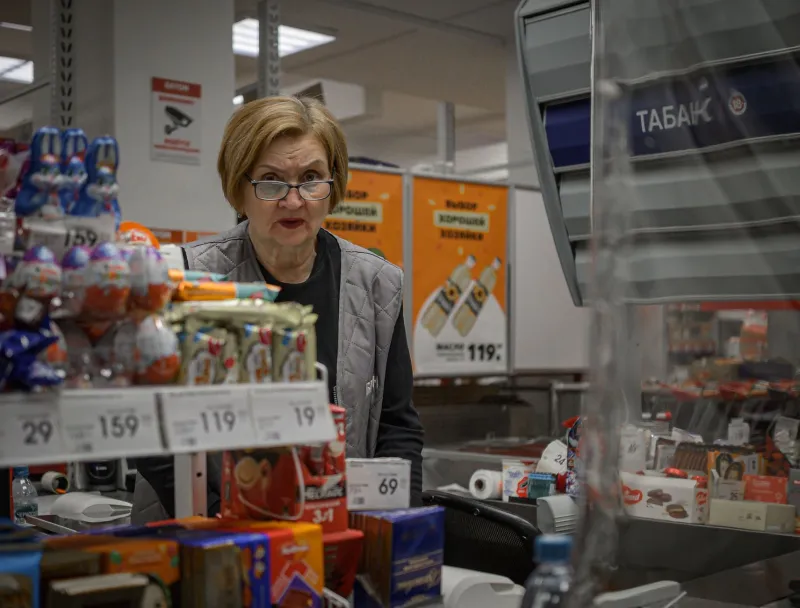 Six Feet of Existential Dread: What the Grocery Checkout Belt Reveals About the American Psyche